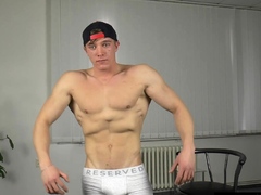 Handsome twink Larry McCormick flex his abs